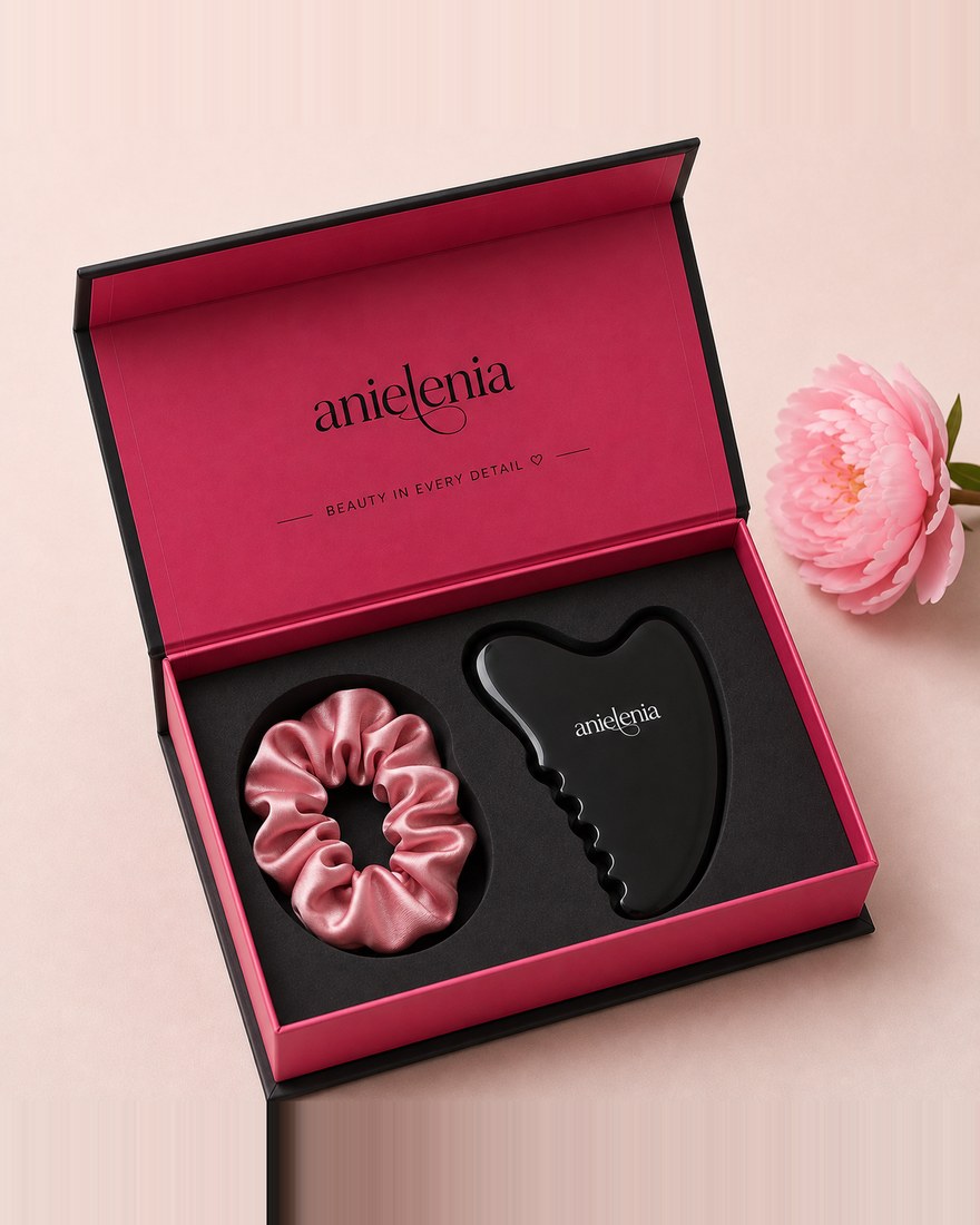 The anielenia Ritual Set, a Bian stone gua sha and a blush silk scrunchie in a rose gift box